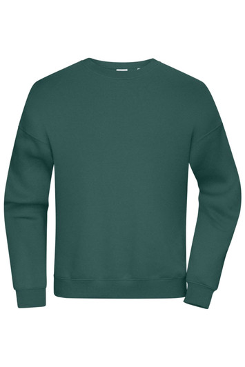 An oversized sweatshirt in a deep green colour, featuring long sleeves and a simple design. It has a logo on the front.
