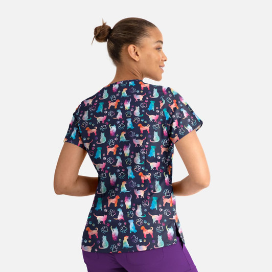 A women's V-neck top featuring a colourful print of various cats and dogs on a navy background. Includes a logo.
