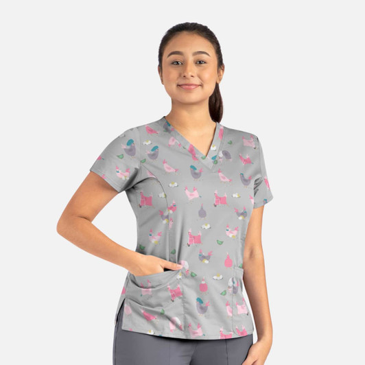 A grey women's V-neck top featuring a playful pattern of colourful cats and other motifs, with visible pockets.