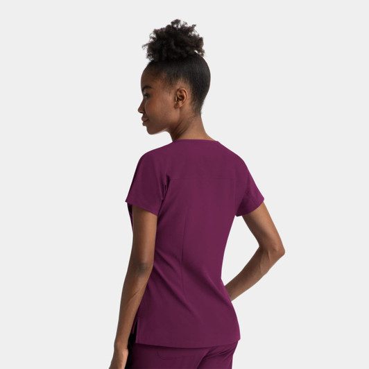 A women's notched neck dolman top in a rich burgundy colour. The top features a simple design and short sleeves.