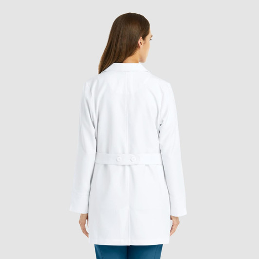 A mid-length women's lab coat in white, featuring a belt and a simple design, with a logo on the back.