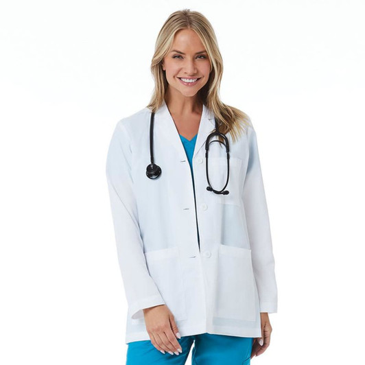 A white women's lab coat worn by a smiling model, featuring a stethoscope and two front pockets.