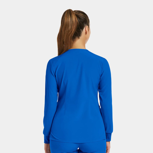 A women's round neck snap jacket in bright blue, featuring long sleeves and a fitted design from the back view.