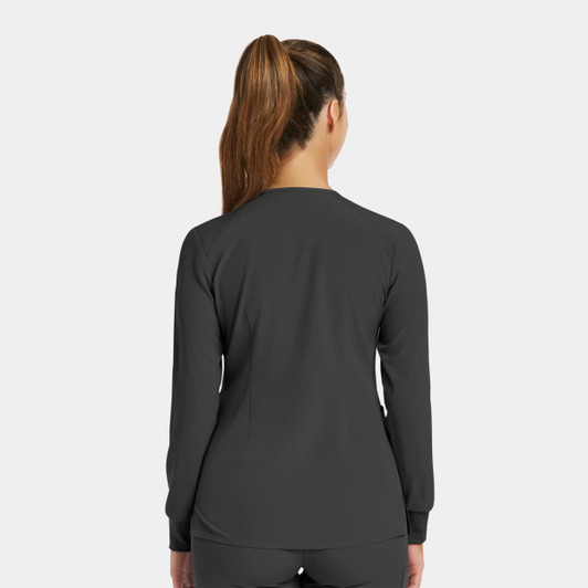 A grey women’s round neck snap jacket with long sleeves, featuring a simple design and fitted style.