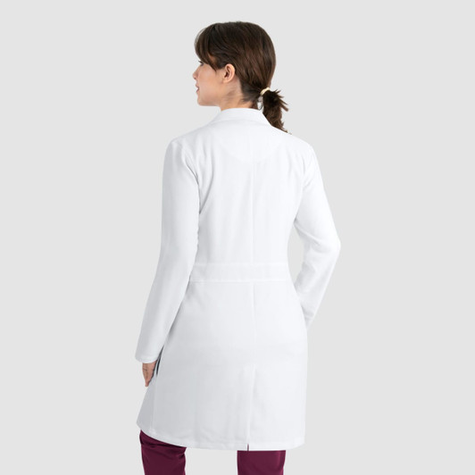 A unisex full-length lab coat in white, featuring a sleek design and fitted silhouette, shown from the back.