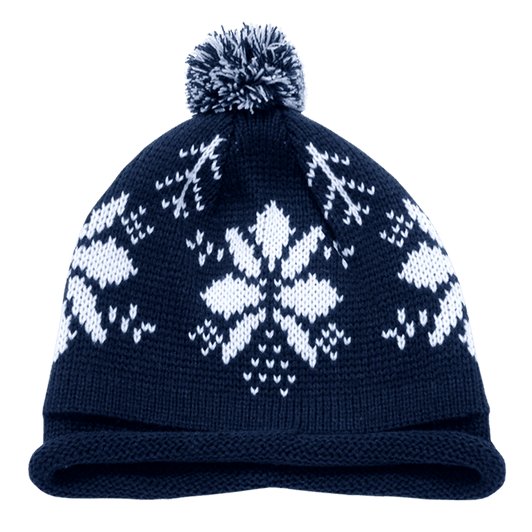 A navy beanie with a white snowflake pattern and a pompom on top, featuring a folded brim.