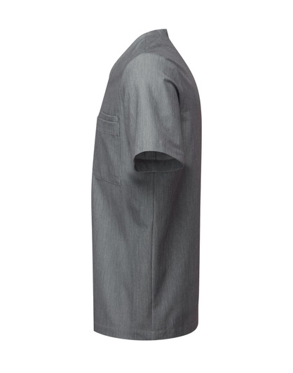 A grey tunic with short sleeves and a pocket, featuring a logo on the side.