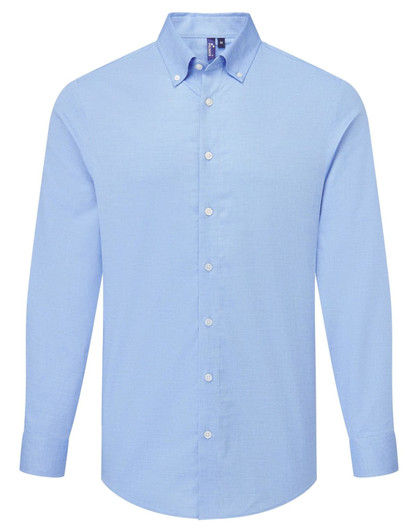A light blue long-sleeve shirt with a button-down collar and a logo on the label.