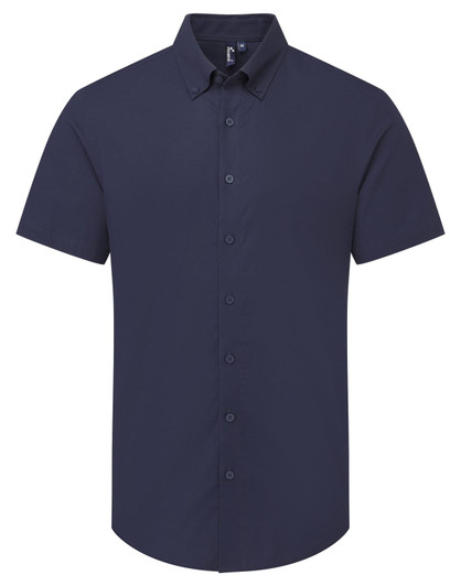 A short-sleeved men's shirt in navy blue with a button-down front and a branding logo on the collar.