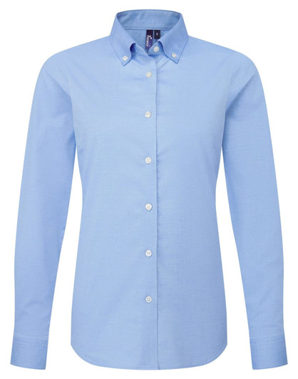 A light blue women's long sleeve shirt featuring a button-down collar and a logo.