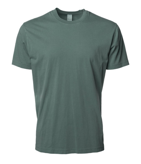 A green Premium Pigment Dye T-Shirt displayed against a plain background, featuring a simple design and branding.