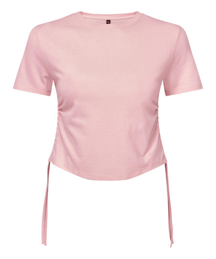 A pink ruched crop top with short sleeves and side ties. It features a logo on the label.