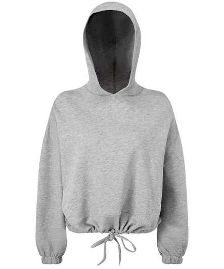 A cropped oversize hoodie in light grey with a drawstring hem and a hood. It features a logo on the front.