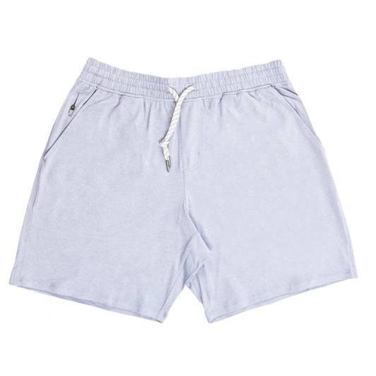 Soft jersey shorts in light blue, featuring an elastic waistband and side pockets. Includes a branding logo.
