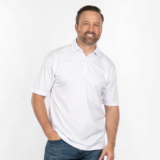A white polo shirt with short sleeves, displayed on a smiling man. The shirt features a collar and has a logo.