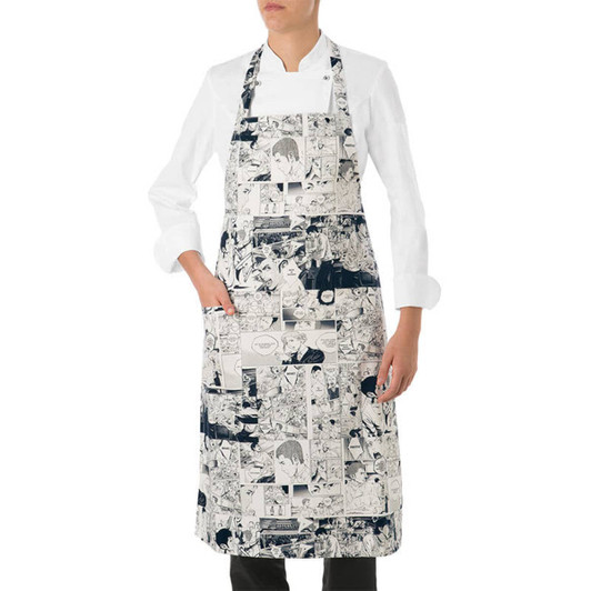 A patterned apron featuring comic-style illustrations in black and white, worn by a person in a white shirt.