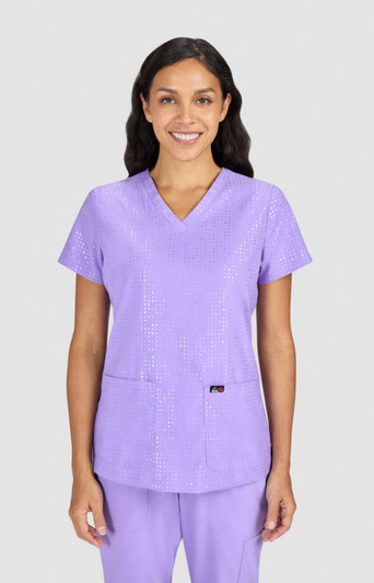 A purple scrub top with a V-neck design, featuring a subtle pattern and a logo on the front.