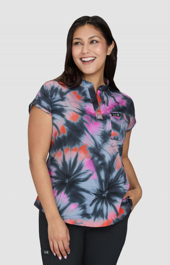 Ari Top (Print) features a vibrant tie-dye design in pink, orange, and grey, with a short collar and sleeves.