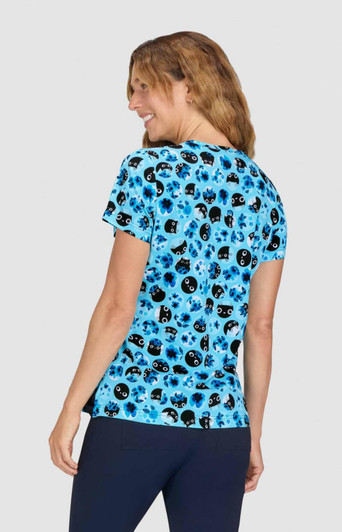 A fitted blue top featuring a fun print of various skull designs in black. The back view shows a round neckline.