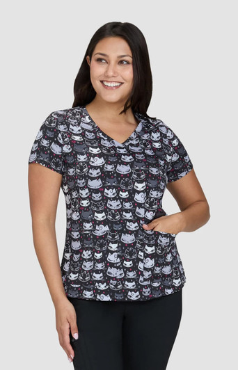 A top featuring a multicoloured pattern of cartoon cats on a dark background. It has a V-neck and short sleeves.