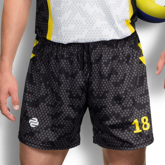 Custom men's volleyball shorts in black with a dotted pattern and yellow accents, featuring a logo and a number.