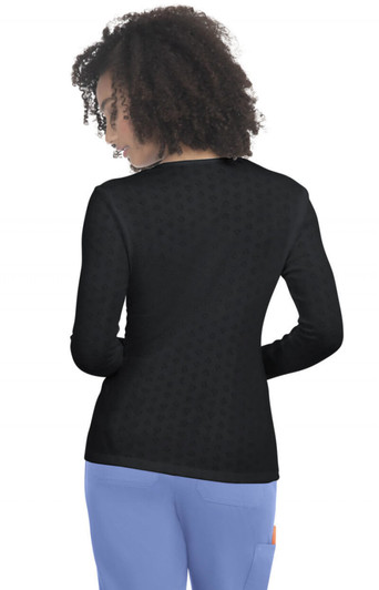 A long-sleeve tee in black, featuring a patterned design on the back and casual fit with a rounded neckline.