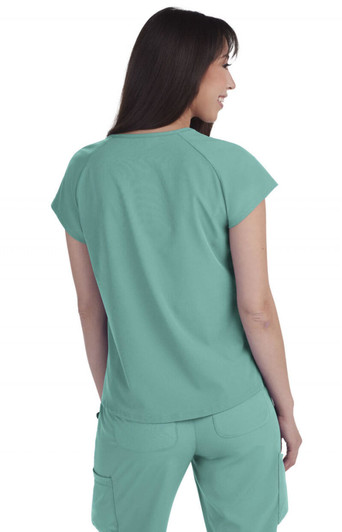 A teal top with short sleeves, featuring a smooth finish, displayed on a model from the back. The top has branding.