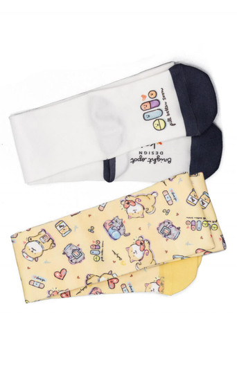 A pair of sublimation socks in white and yellow, featuring playful designs and a logo on one sock.