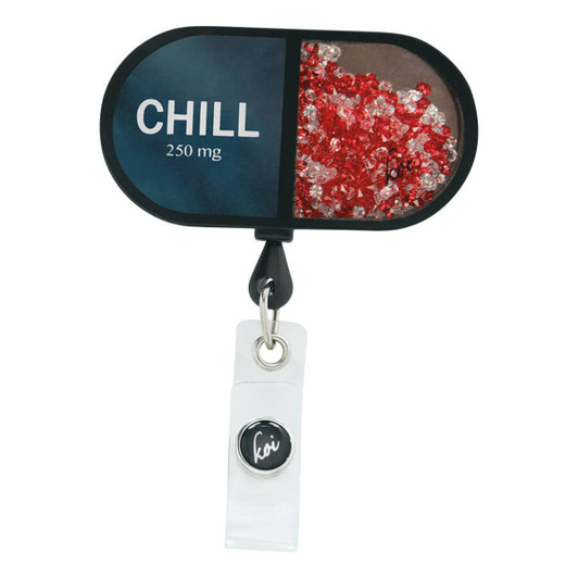 A shaker badge with a black and white design, featuring red and white crystals within a clear compartment and a logo.
