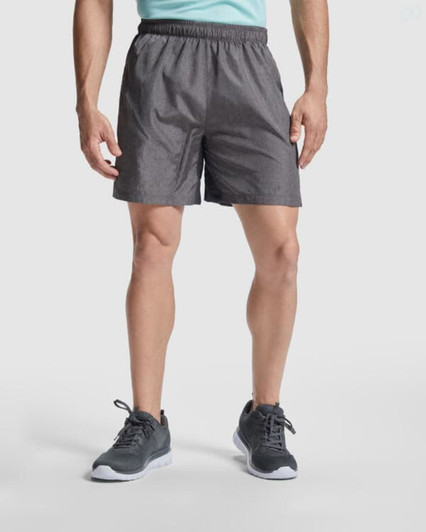 Celtic shorts in dark grey, featuring an elastic waistband and a logo on the side. Ideal for sports and outdoor activities.