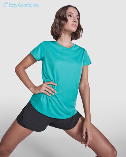 A turquoise women's T-shirt with a sleek design, paired with black shorts, featuring a logo on the shirt.