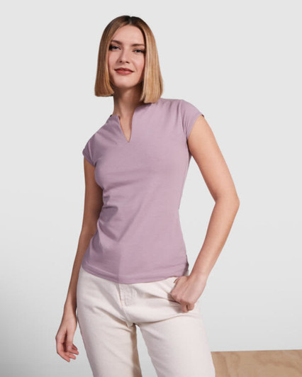 A lilac T-shirt with a V-neck and short sleeves, worn by a model with straight hair and a neutral background.