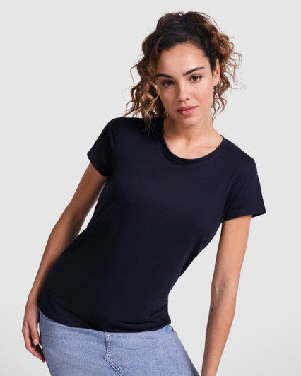 A navy blue t-shirt with short sleeves, worn by a model in a casual pose. The shirt features a logo.