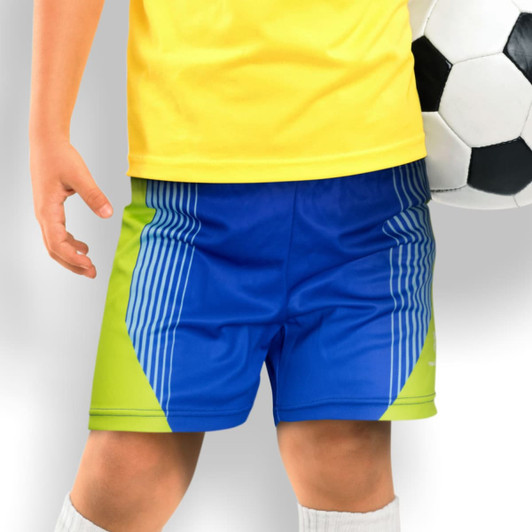 Custom kids sports shorts in blue and green with a sporty design, paired with a soccer ball.