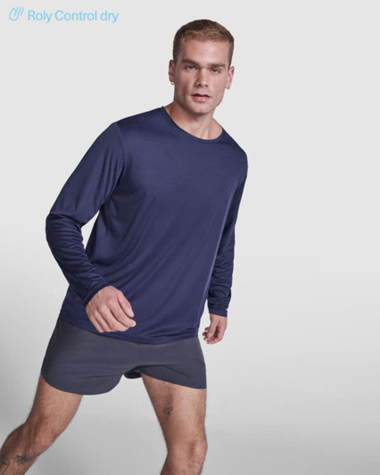 A long-sleeved navy T-shirt worn by a model, paired with grey shorts. The T-shirt features a branding logo.