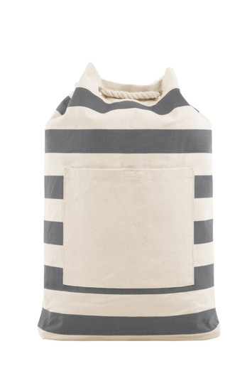 A striped beach backpack in cream and navy, featuring a front pocket and a rope handle. It has a logo on it.