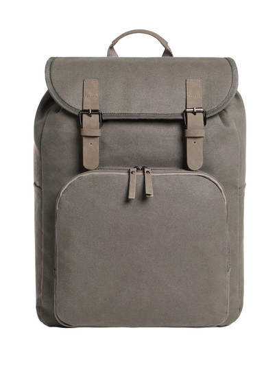 A grey backpack with a fold-over top, buckle straps, and a front zip pocket. It features a logo on the side.