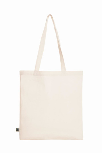 A cream tote bag with fabric handles and a small branding label at the bottom.