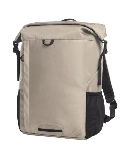 A beige and black Mellow Backpack with a roll-top design and adjustable straps, featuring a logo.