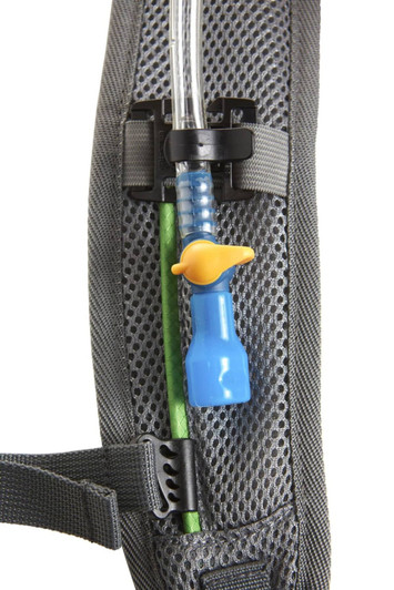 A drink tube with a blue nozzle and green straw attached to a grey backpack. The bag features a logo.