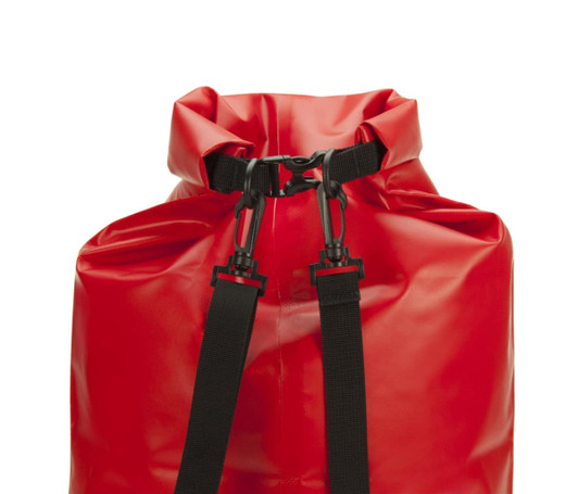A red dry bag with a roll-top closure and adjustable black straps, featuring a hardware clasp.