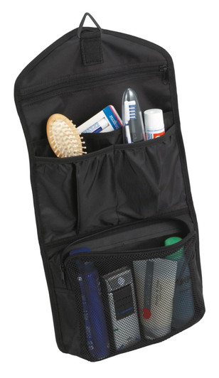 A black toiletry bag with various personal care items, including a toothbrush, comb, and grooming products.