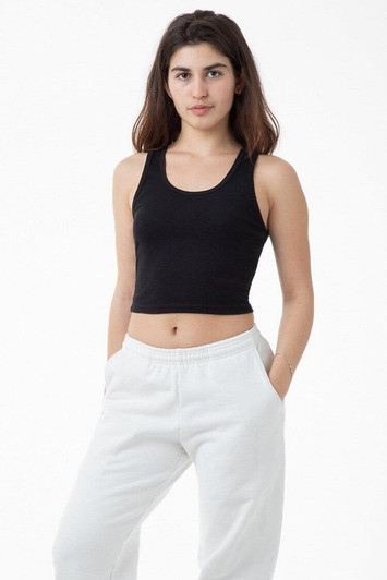 A black 2x1 rib crop tank top paired with white sweatpants, featuring a logo.