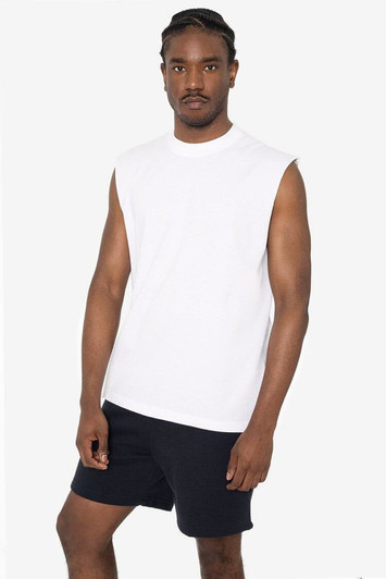 A sleeveless white tee displayed on a model, paired with black shorts. The shirt features a logo.