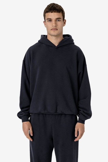 A navy blue pullover hoodie made from plush fleece, featuring a hood and a relaxed fit.