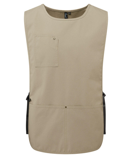 A tan utility vest apron featuring a front pocket and two lower pockets, with a black adjustable waistband.