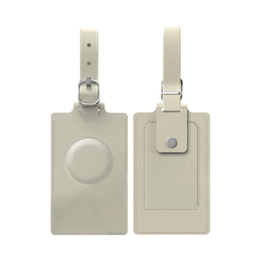 A beige luggage tag with a rounded section on one side and a snap fastener on the other. It features a metal attachment.
