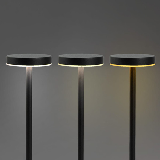 Three black rechargeable table lamps with round tops and adjustable light settings against a grey background.