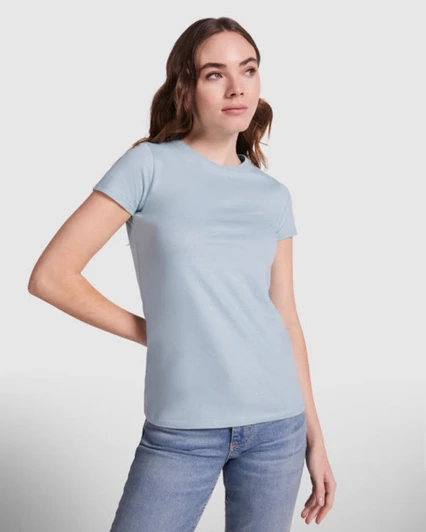 A light blue Capri T-Shirt displayed on a model, featuring a fitted design and short sleeves.