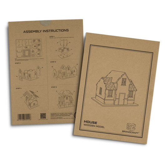 A flat, brown cardboard packaging featuring assembly instructions for a wooden house model in black line art.